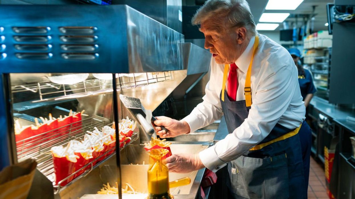 Trump taps into the heart of wholesome Americana working McDonald's drive-thru, serving up fries