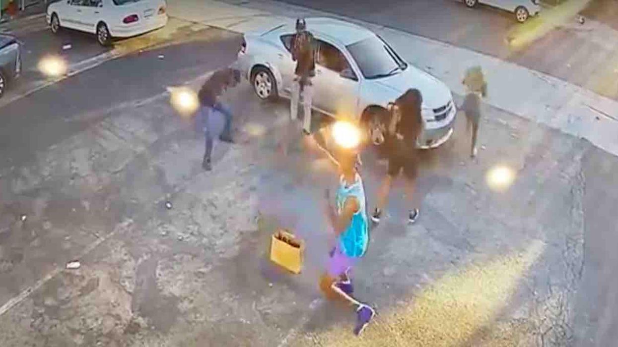 Two parolees pull gun on group in apparent robbery attempt. But one victim has gun of his own — and shoots both assailants who take off running.