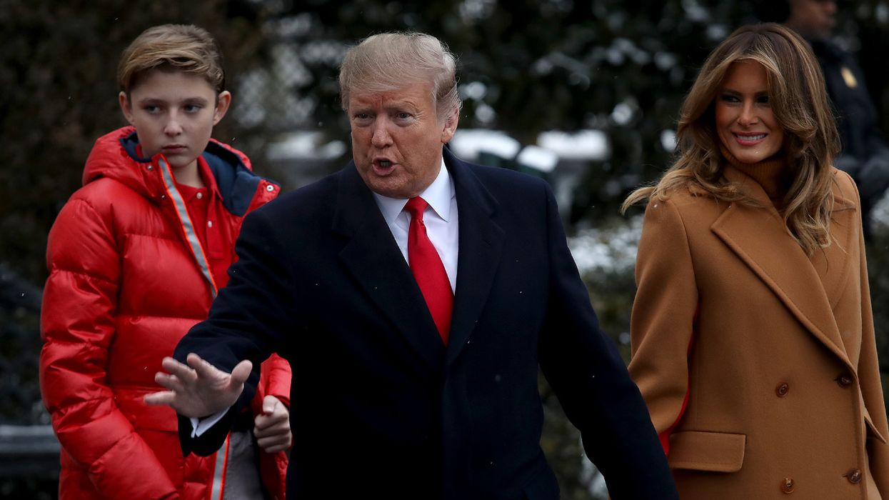 U.S. President Donald Trump (C) departs the White House with first lady Melania Trump (R) and their son, Barron (L), February 01, 2019 in Washington, DC. Trump is scheduled to travel to his home in Florida in December 2018.