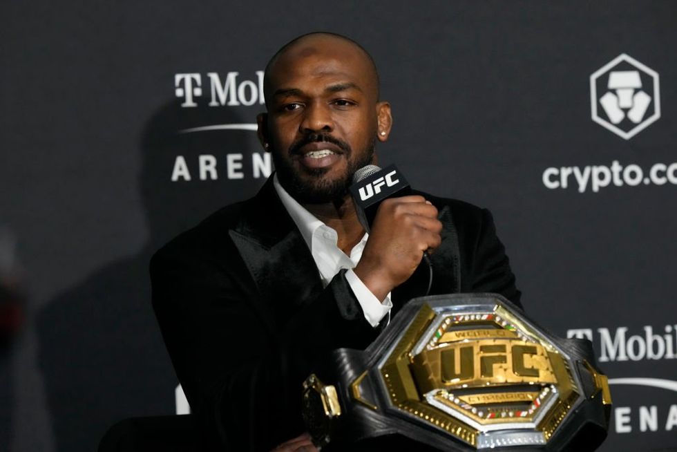 UFC champ Jon Jones accused of death threat by drug tester‚ who is seen high-fiving him in video after alleged incident
