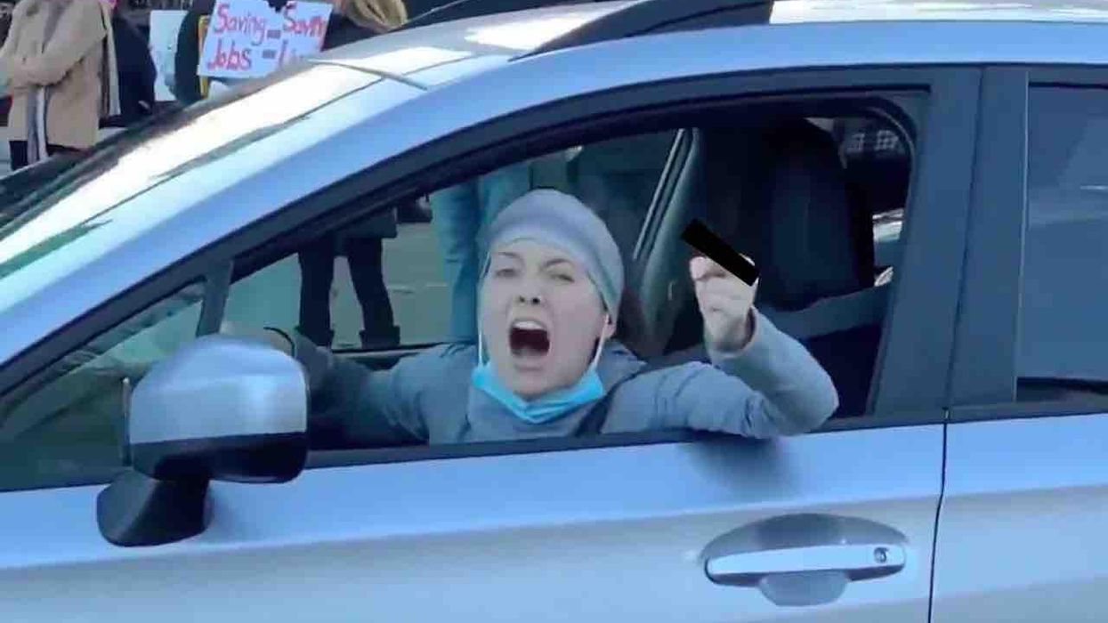 Unhinged leftist 'teacher' absolutely flips out on peaceful anti-lockdown protesters in Oregon: 'F*** all of you!'