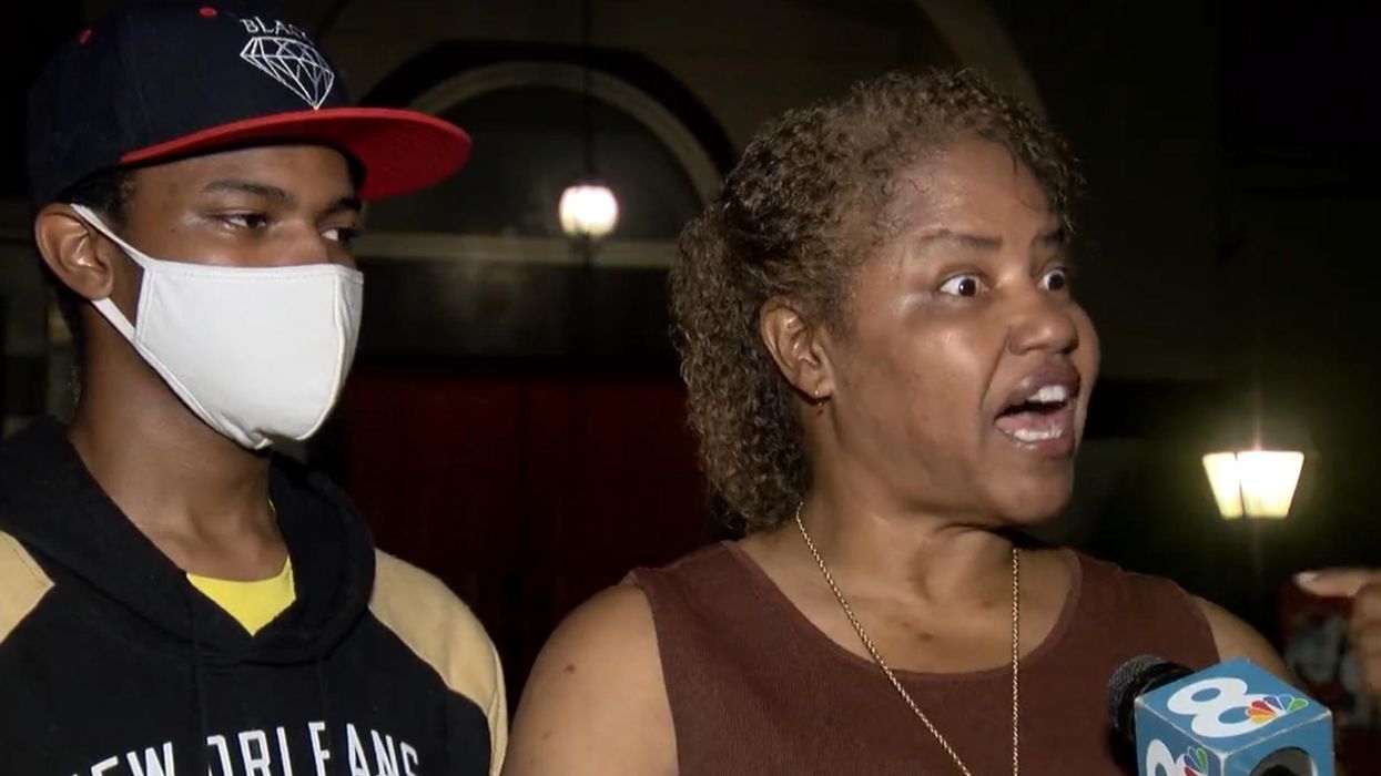 Unmasked mom, standing next to masked son, claims Gov. DeSantis is 'putting us at risk' by denouncing masks