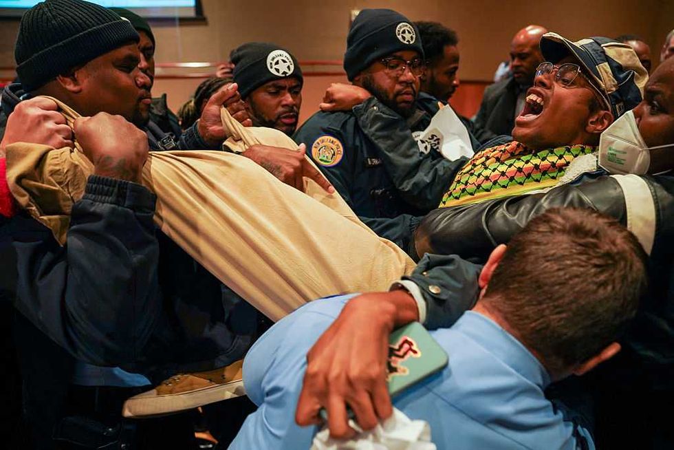 Unruly anti-ICE protesters shut down NOLA city council meeting — police carry out activist