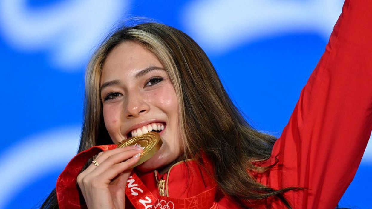US-born and raised ski star Eileen Gu faces backlash after taking home Olympic gold for China, fires back at critics with a biting response