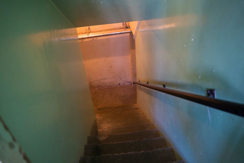 Utah man finds stranger living in storage room of his basement