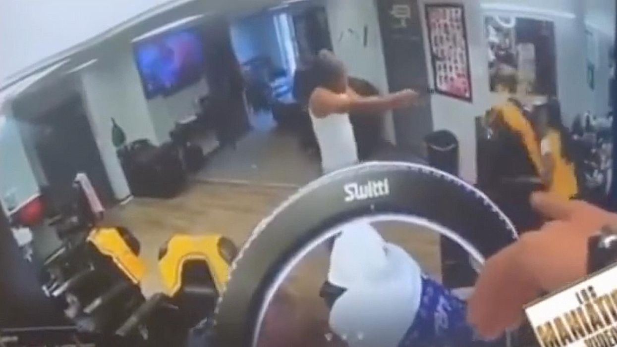 Video: Armed off-duty cop shoots and kills gunman who burst into barbershop and killed barber
