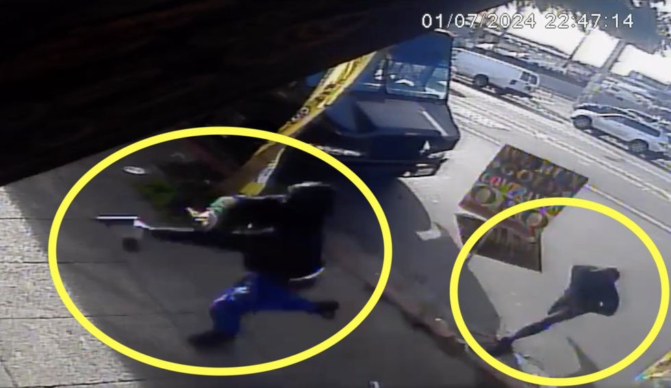 Video: Armed thugs who rush into jewelry store have fast change of heart when worker with gun sends them some smoke