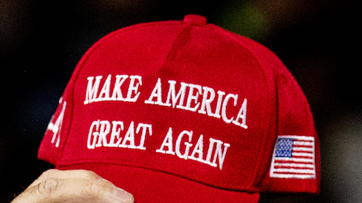 Video: Bartender grabs baseball bat, pounds it on floor, demands female Trump supporter leave bar — because of her MAGA hat