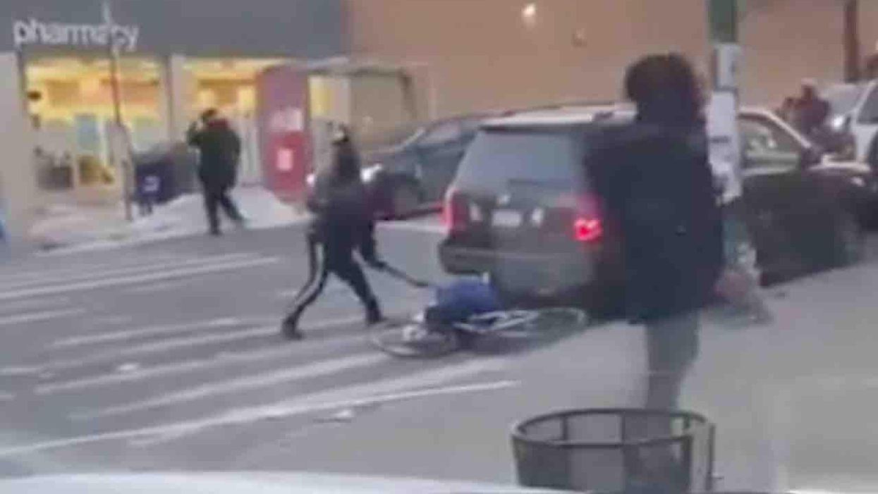 VIDEO: Bat-wielding thug beats bicyclist unconscious on Brooklyn street — and nearly every bystander just watches or walks on by like it's nothing