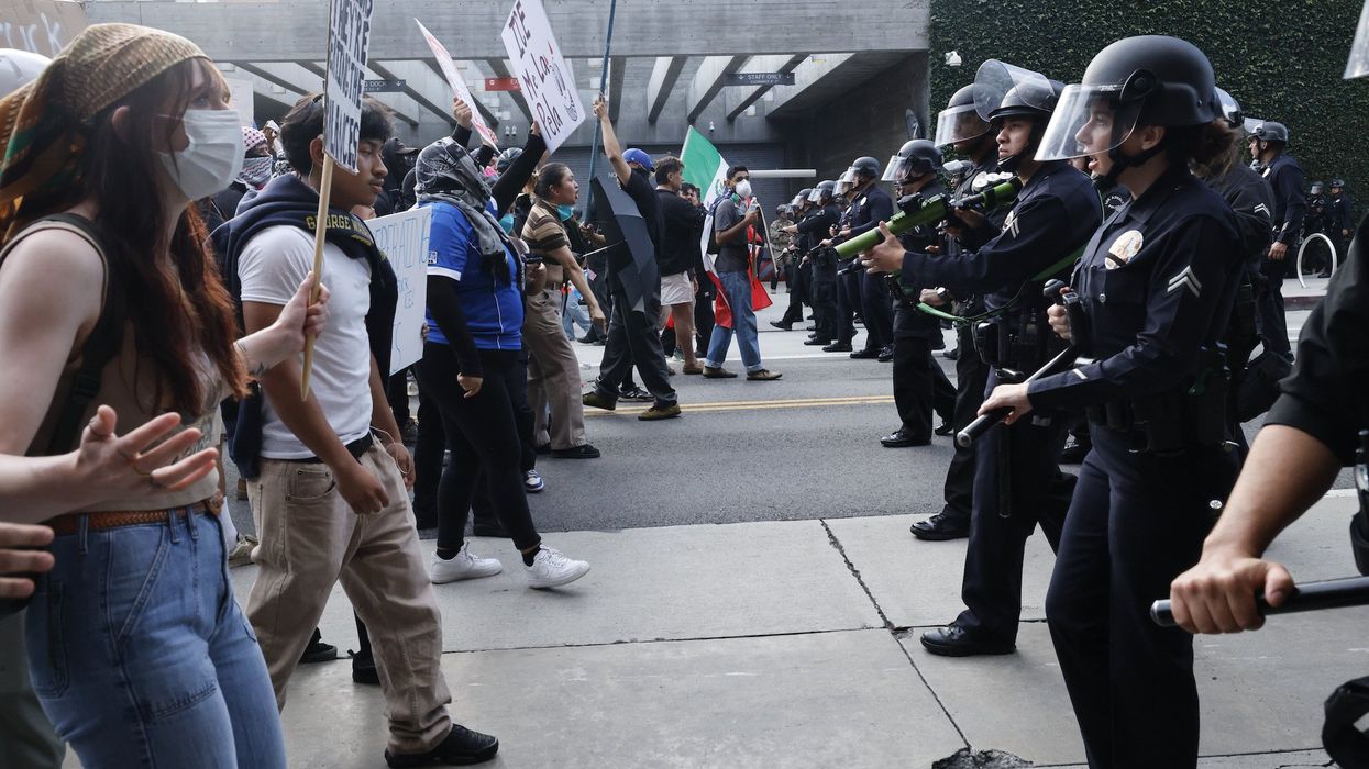Video captures the moment SUV driver barrels through No Kings protesters after getting surrounded in California