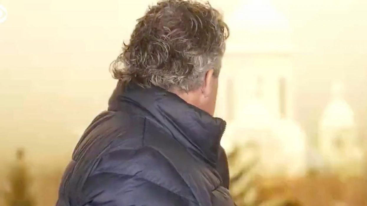 Video: CBS reporter and crew dive for cover during live report as humongous explosion rattles Kyiv