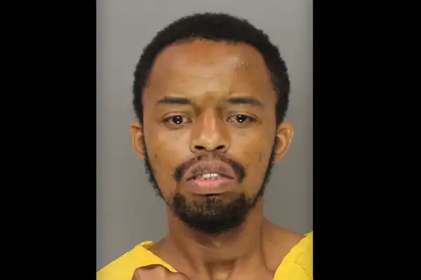 Video: Creep chases child at gas station, then mom threatens thug with the only weapon she has