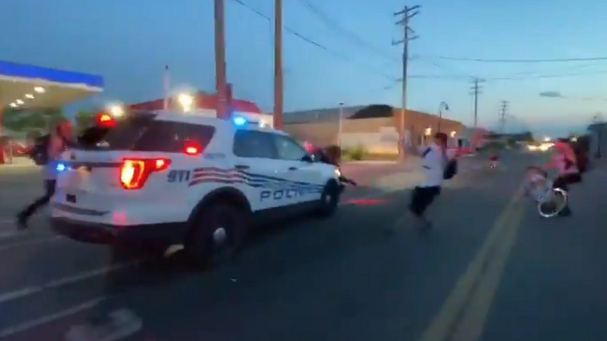 VIDEO: Detroit police appear to plow through crowd of protesters surrounding patrol car
