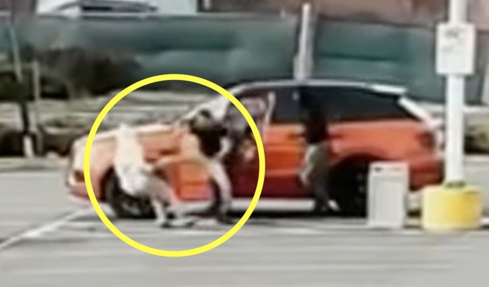Video: Driver fights off carjackers who try to steal his luxury SUV. Victim manages to get away; crooks depart disappointed.