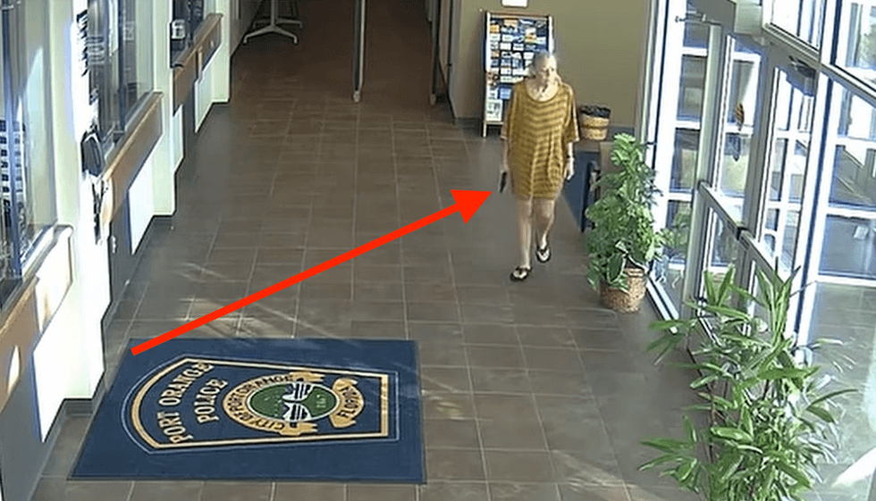 Video: Gun-toting, elderly Florida woman opens fire in police station. Things don't end well for her.