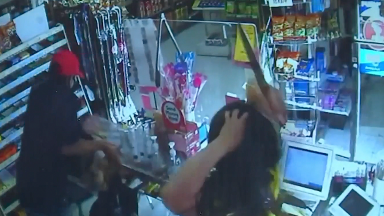 Video: Gutsy female cashier turns the tables on knife-wielding crook, wrestling weapon from him and chasing him out of store
