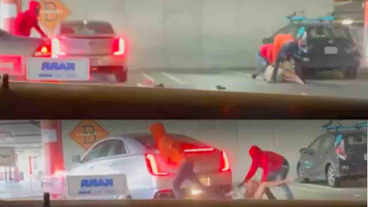 VIDEO: Hooded carjackers gang up on screaming woman; kick, punch, and rob her in parking garage before stealing vehicle