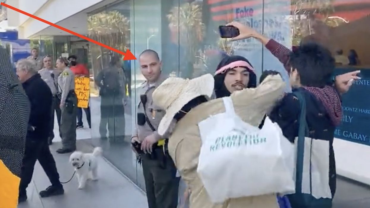 Video: Leftist militant sucker-punches videographer in head outside drag queen story hour — and sheriff's deputy standing just feet away does nothing