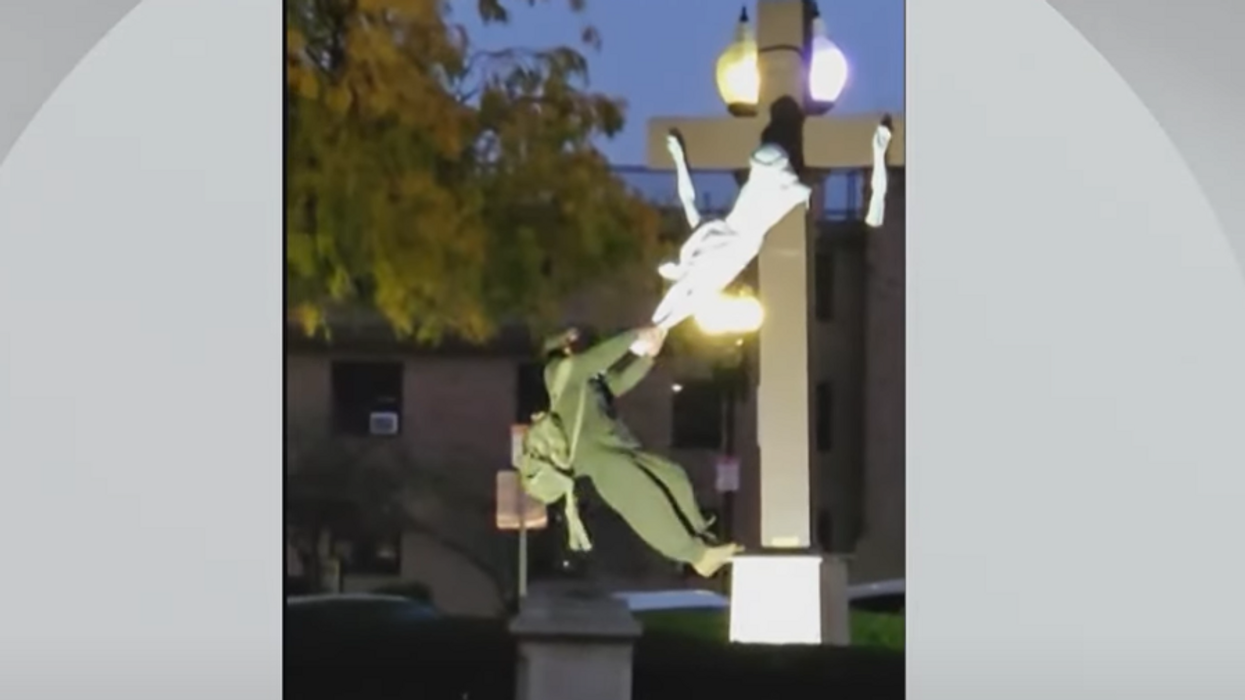 Video: Man accused of snapping off arms of Jesus on 150-year-old statue in Boston, cursing out priest