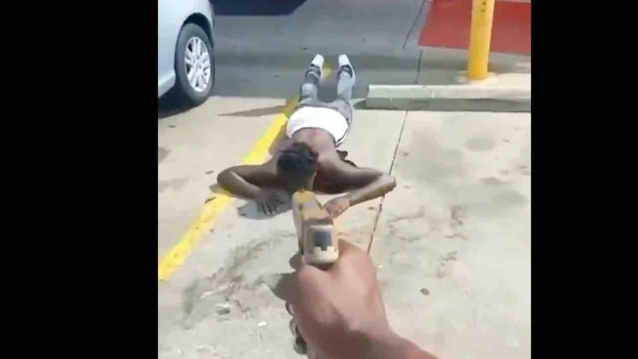VIDEO: Man holds thug at gunpoint after allegedly catching him trying to steal his car