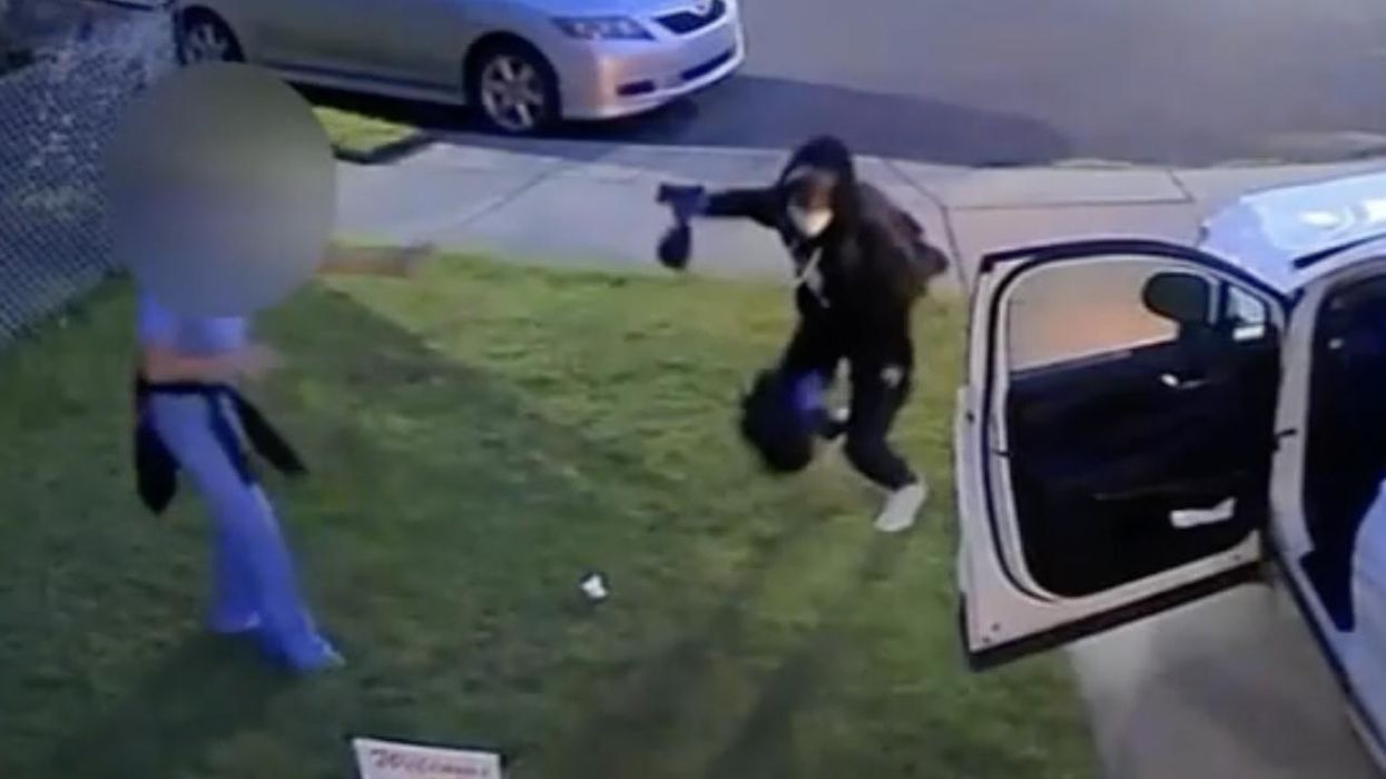 Video: Mother, teen daughter carjacked in their own driveway after handgun-toting crook apparently waited for them to exit Philly home early in morning