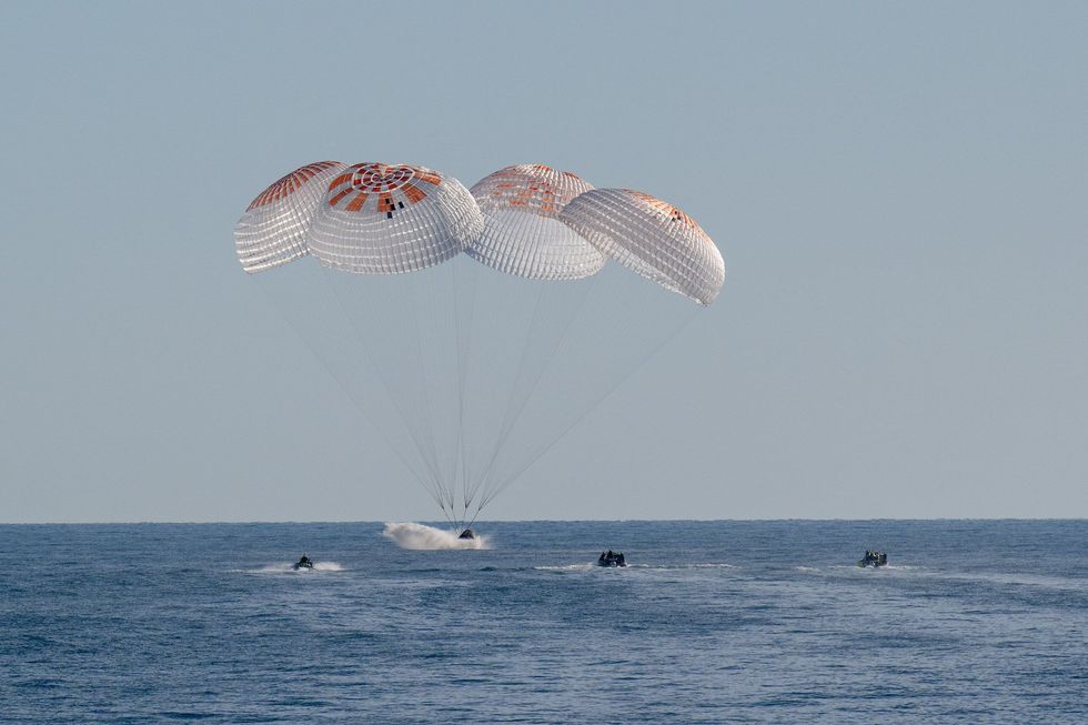 VIDEO: NASA astronauts stranded in space by the Biden admin splash down in SpaceX capsule