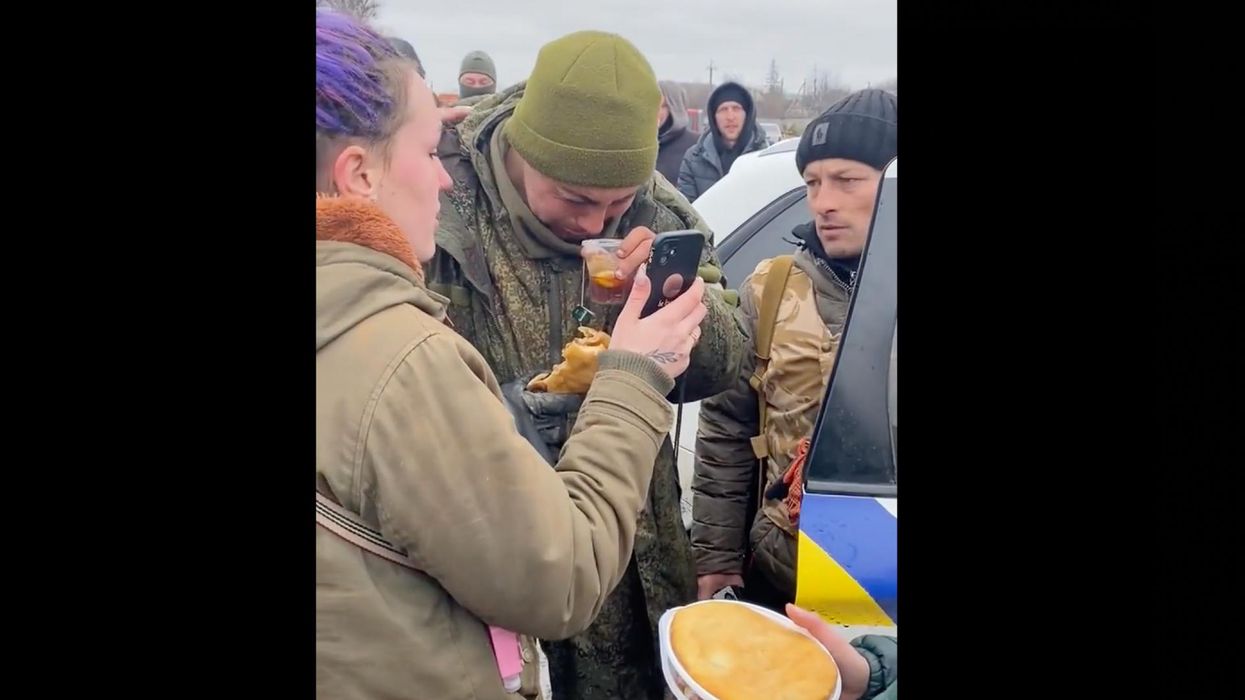 Video of young, crying Russian soldier being fed and cared for by kind Ukrainians goes viral