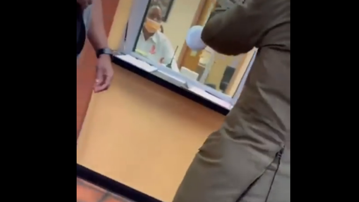 VIDEO: Outraged mother shouts down NY school officials for holding maskless students in the library