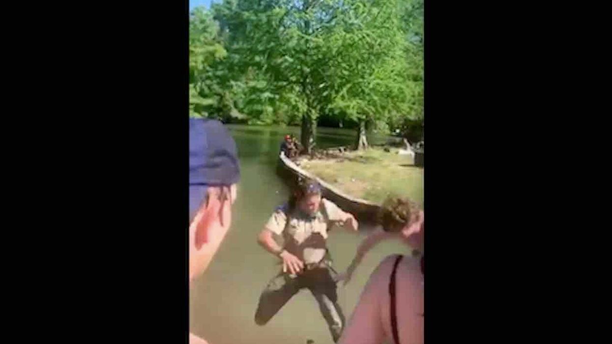 VIDEO: Park ranger shoved into lake while giving social distancing instructions to crowd that was illegally drinking, smoking
