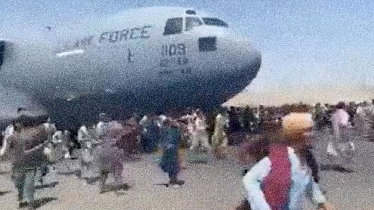 Video shows desperate Afghans trying to escape country by jumping on air-bound US planes, falling from hundreds of feet: 'No words can describe these scenes'
