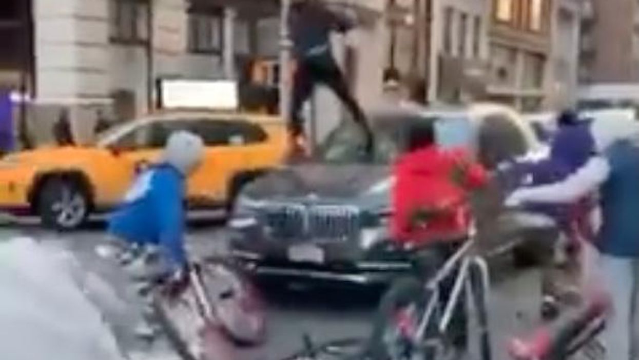 Video shows gang of young bicyclists in 'animalistic attack' on BMW in Manhattan in broad daylight: 'Welcome to de Blasio's NYC'