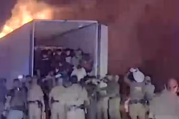 Video shows police PULLING 39 illegal aliens from tractor trailer that caught FIRE while fleeing from police