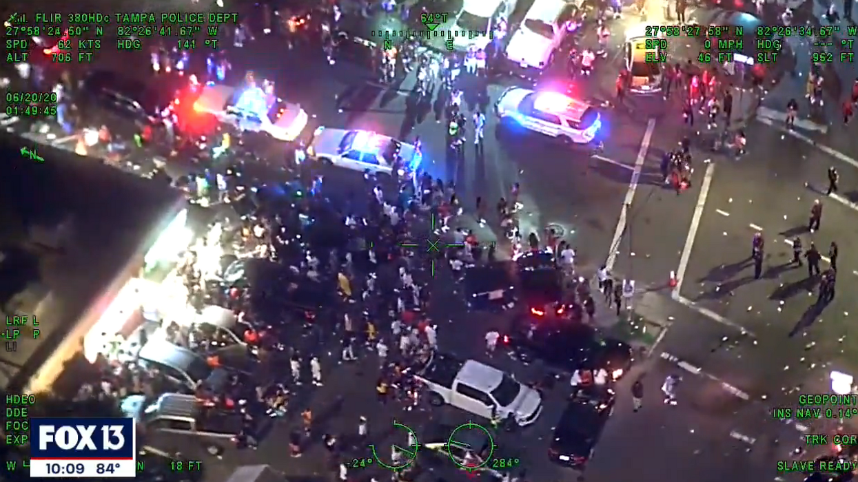 VIDEO: Tampa cops 'ambushed' by hundreds of protesters while trying to find a shooting victim
