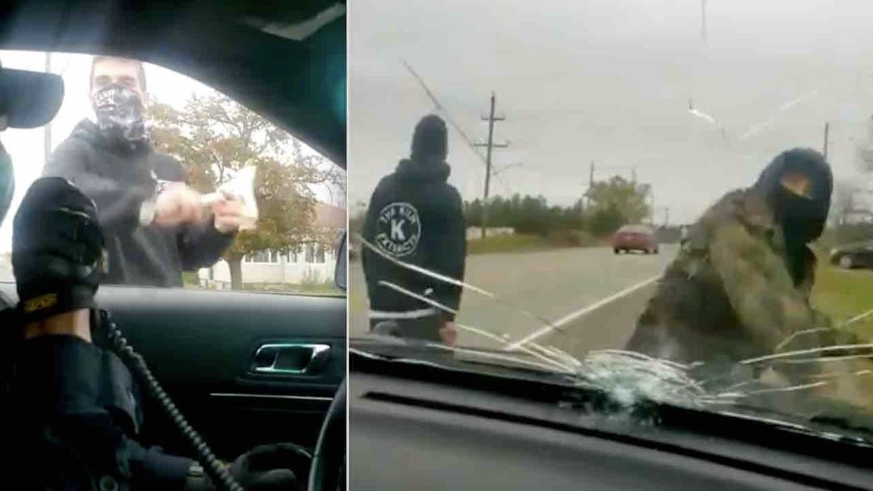 VIDEO: Thugs brazenly smash Canadian police cruiser with rocks, lacrosse stick while cops manage to stay calm in their seats