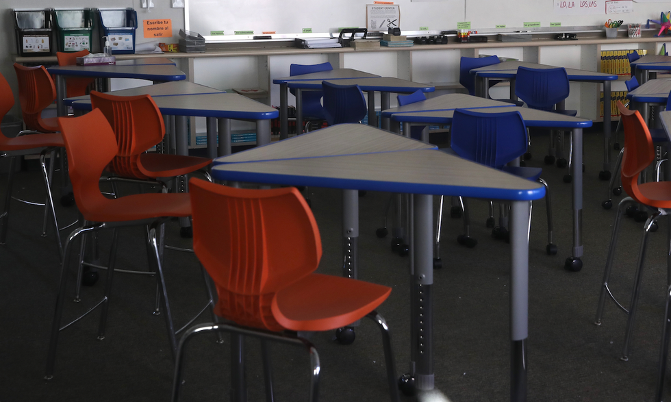 Viral video: Much larger male finishes middle school fight by slamming female's head on table. But cops say he's the victim.