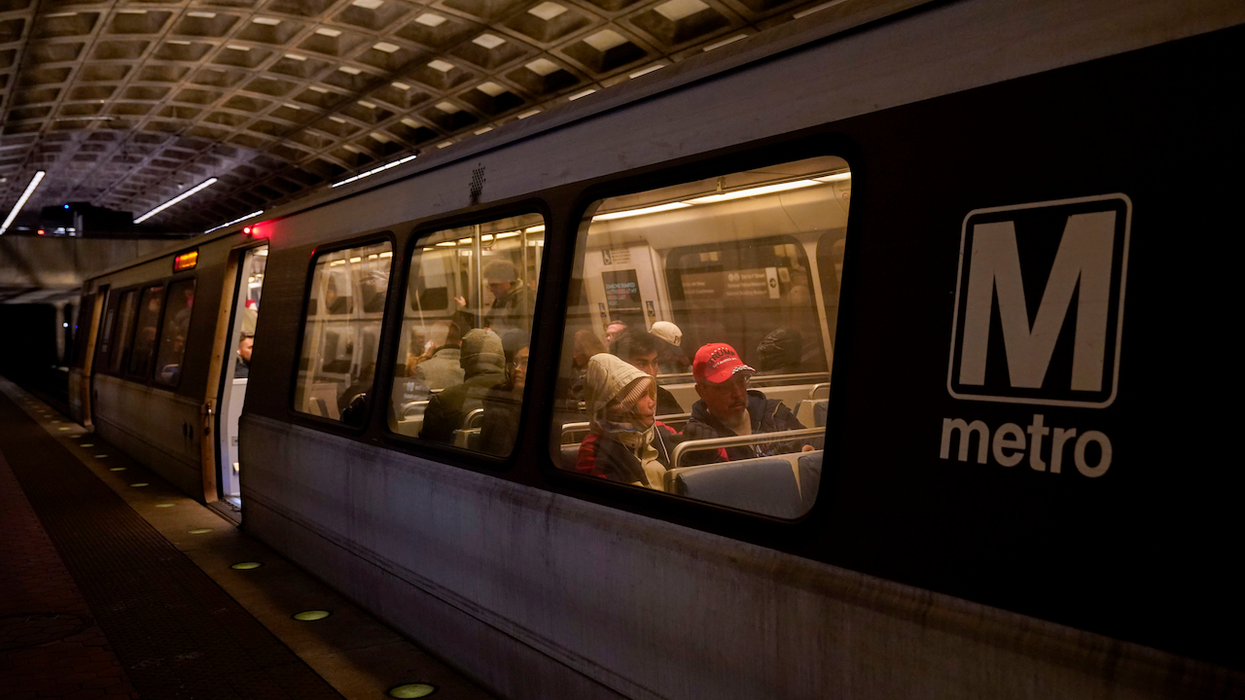 Viral video: Train rider seems afraid, puts up no fight when thug brazenly takes pricey Canada Goose jacket right off his back