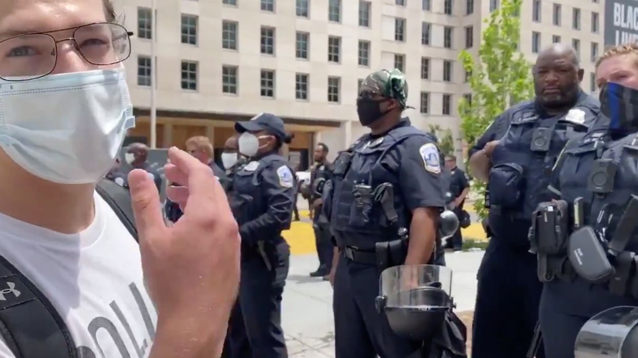 Viral videos show white protesters shaming, abusing black police officers. It gets embarrassing.