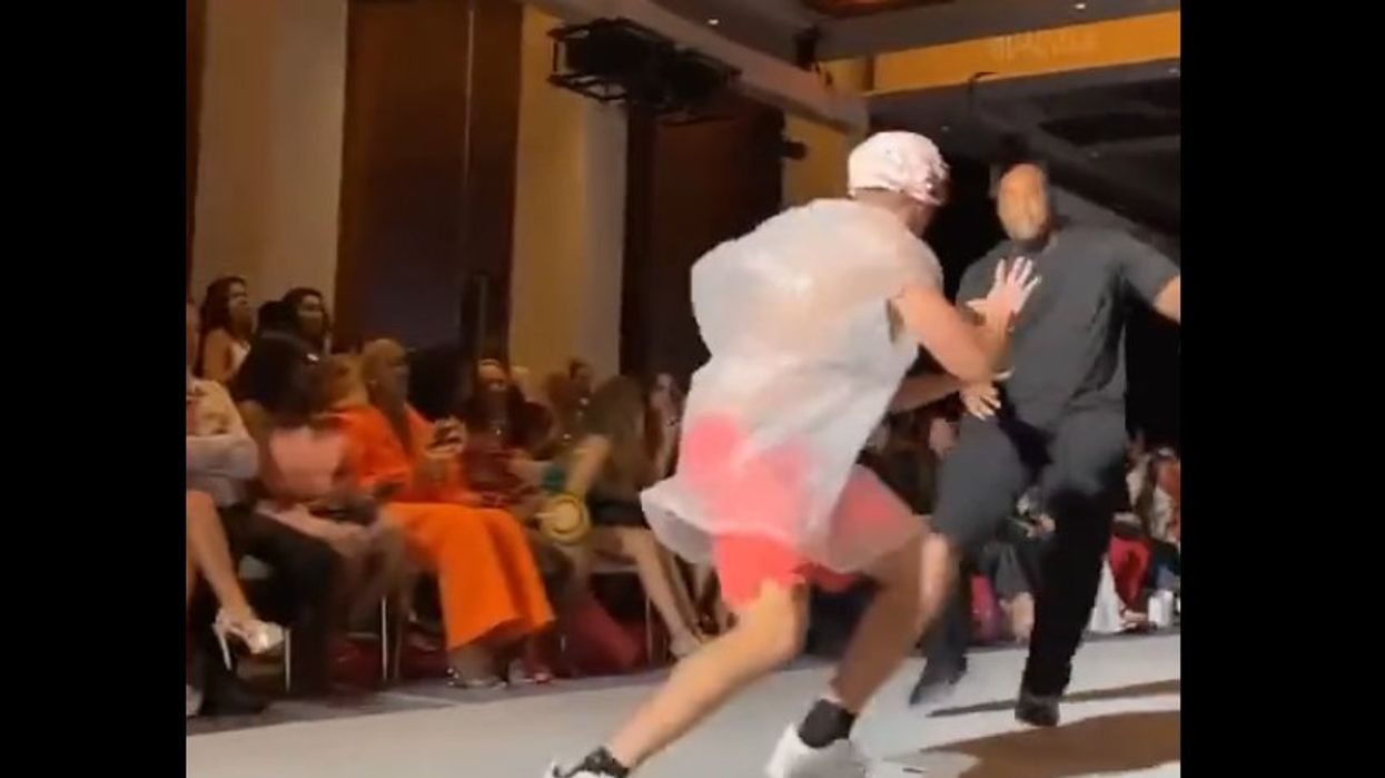 Watch: Prankster tackled after seamlessly taking to New York Fashion Week  runway in a garbage bag