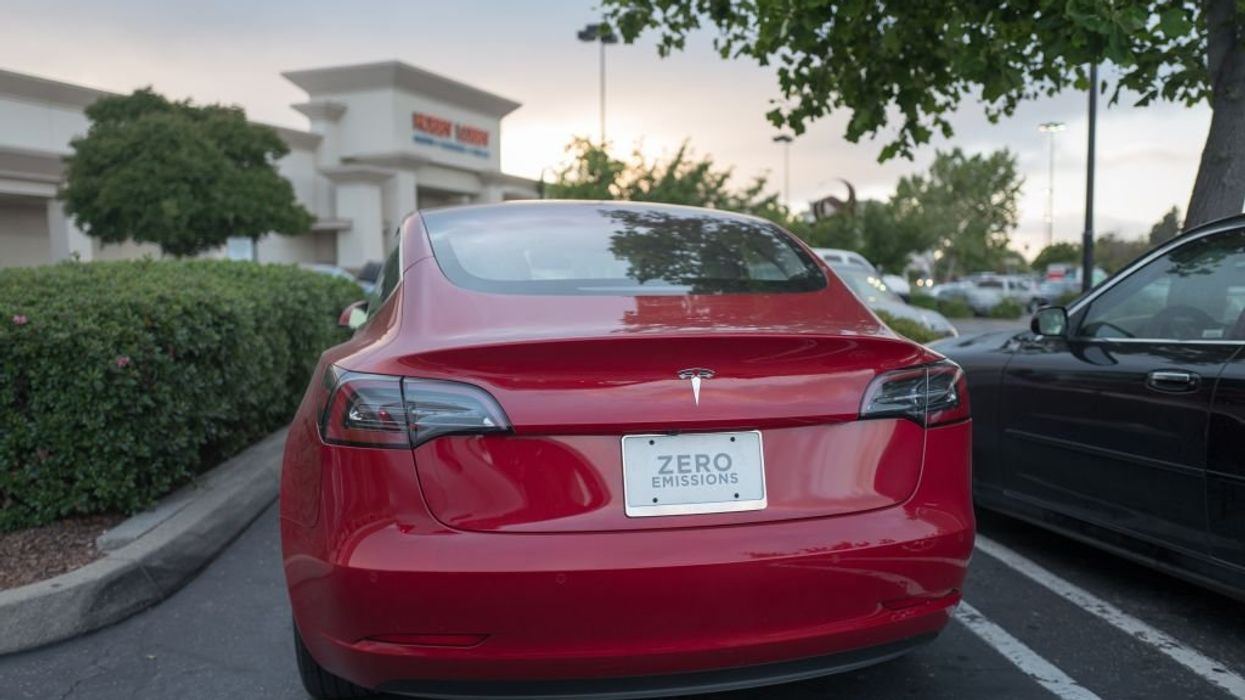 Watch: Suspect accused of scrawling swastika into Tesla sings a different tune when confronted by EV owner