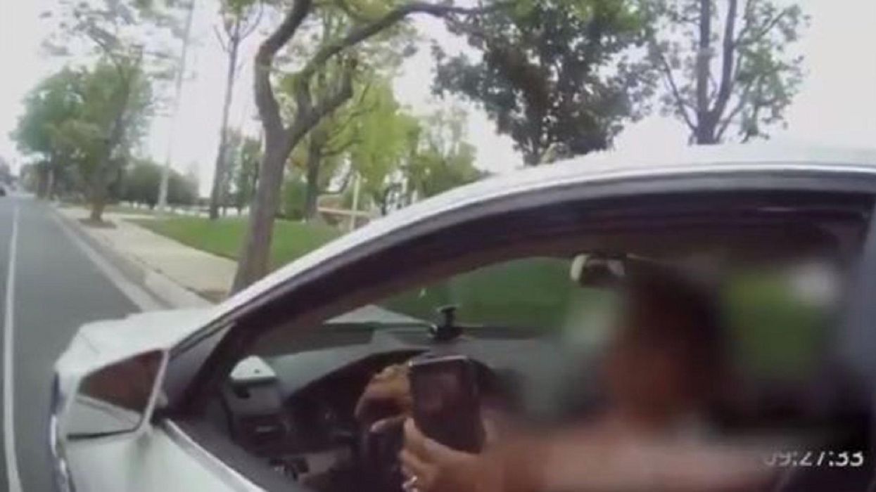 Watch: Teacher goes on racist rant against deputy who pulls her over, repeatedly calling him 'a murderer'