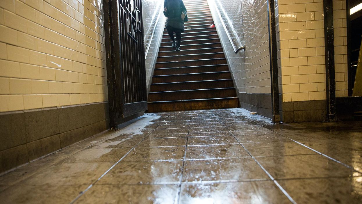 ‘We don’t know if she’s going to make it’: Woman suffers critical head injury after being yanked down subway stairs during botched robbery