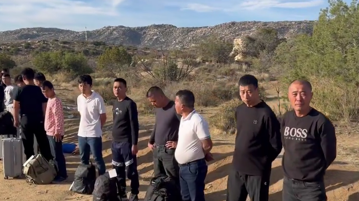 Well-dressed Chinese migrants with high-quality luggage stopped and processed after trying to cross border into California