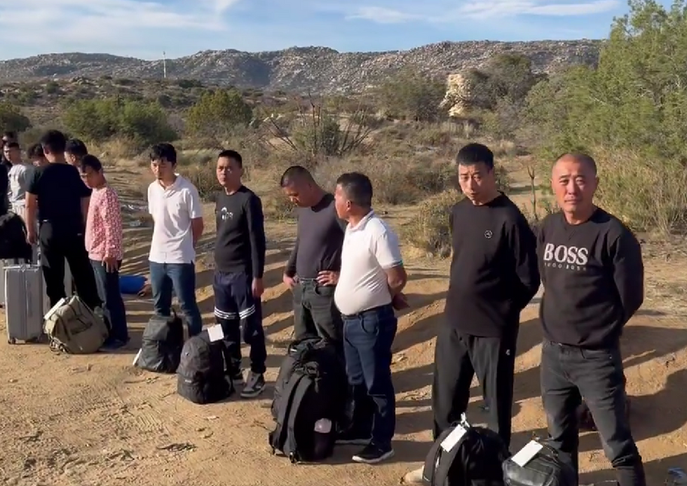 Well-dressed Chinese migrants with high-quality luggage stopped and processed after trying to cross border into California