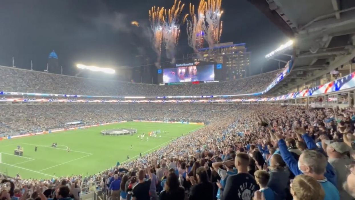 'Well, that brought tears to my eyes': Singer's microphone fails during 'The Star-Spangled Banner' — so about 75,000 Charlotte fans take over