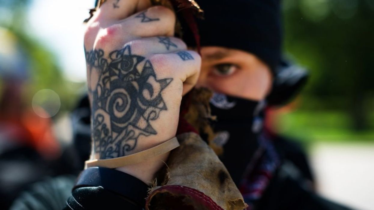 What do you call 12 Antifa radicals in body armor?