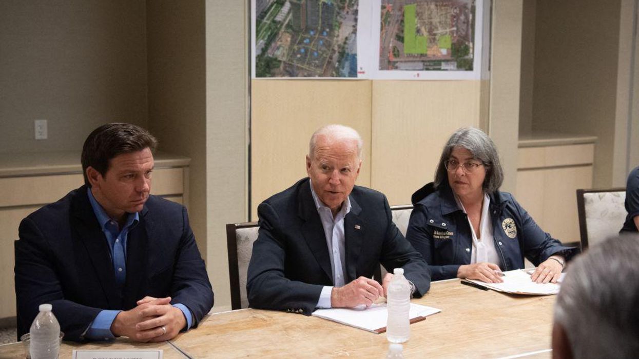 While in Florida, Biden says federal government will cover 100% of cost of Surfside building collapse and rescue efforts