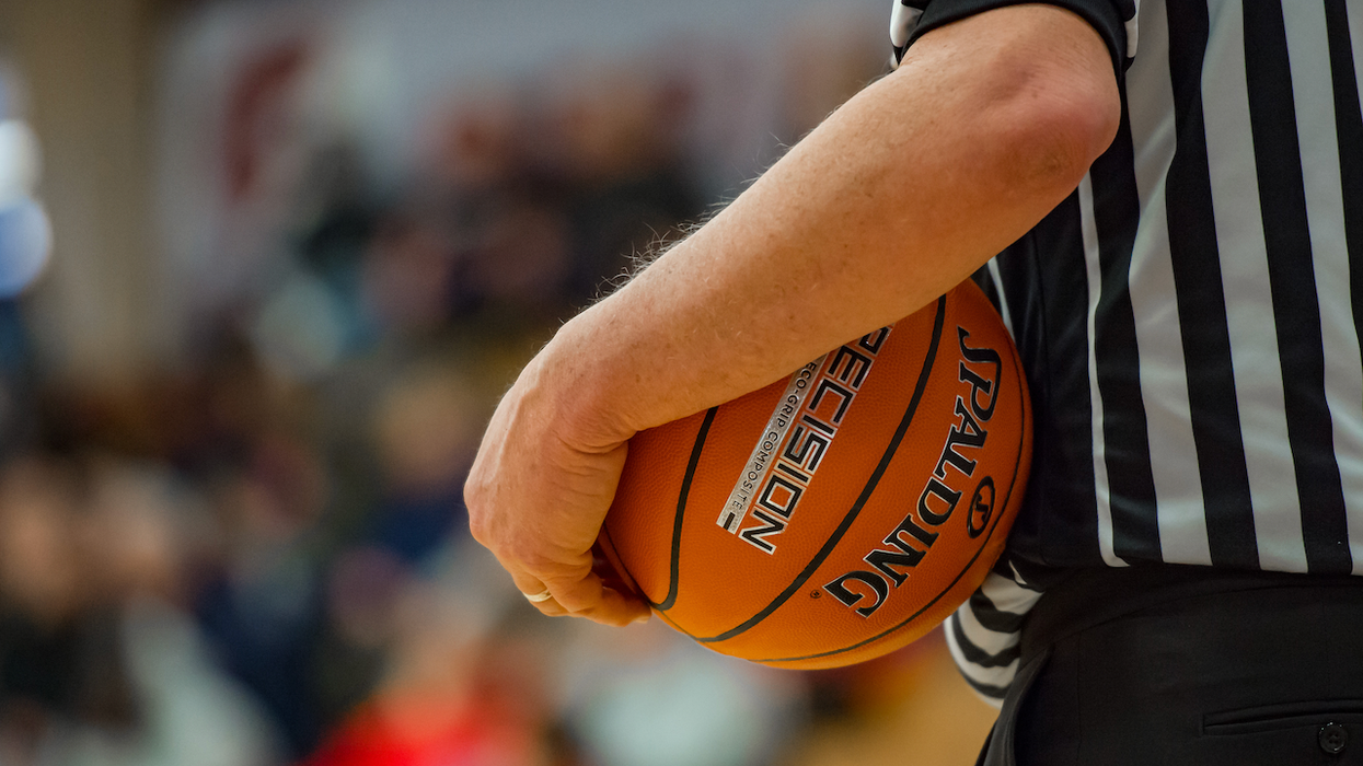 White-haired HS basketball referee knocked down by thrown objects after game; coach allegedly 'involved' in incident is fired