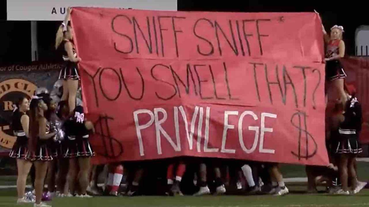 White privilege banner directed at Catholic HS before football game infuriates parents: 'It's not right'
