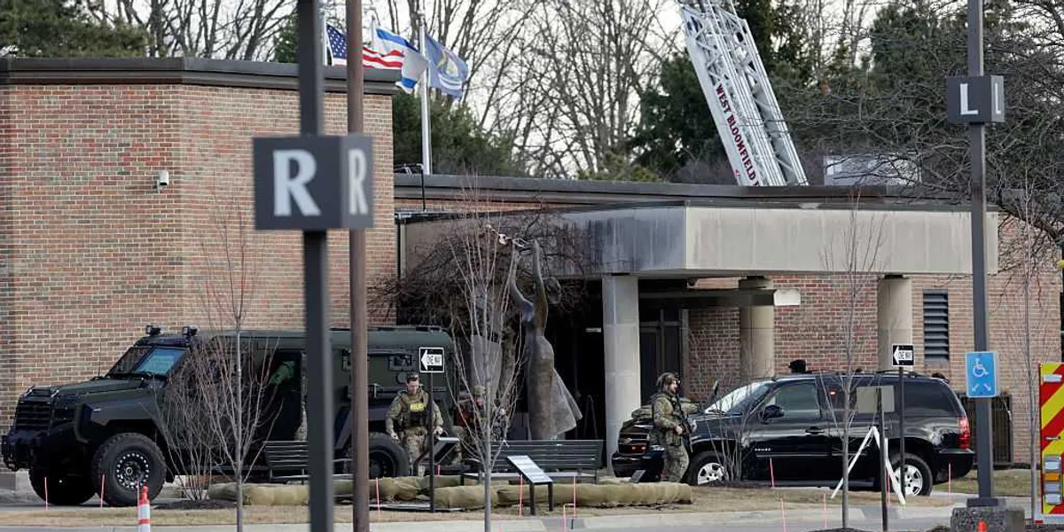 Who is the naturalized US citizen from Lebanon identified as the Michigan synagogue school attacker?