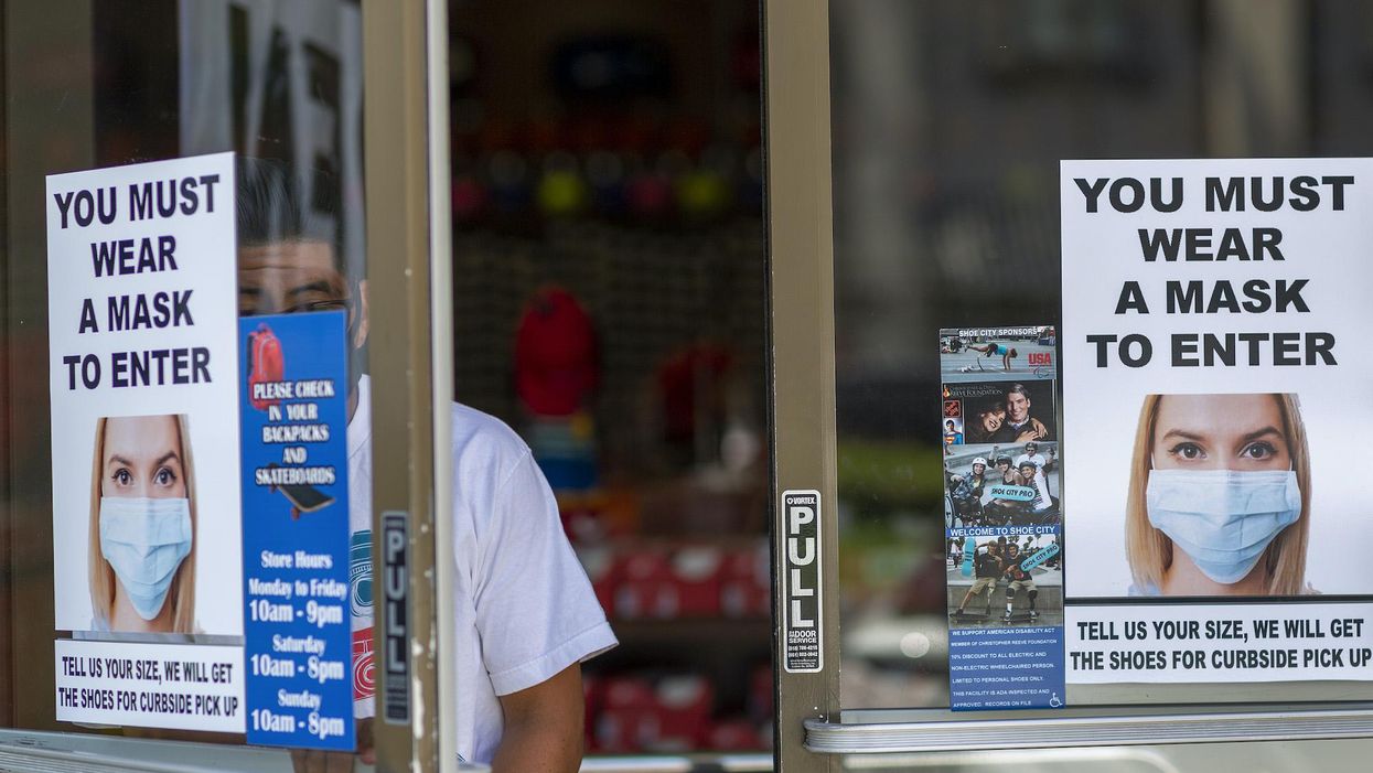 WHO says fully vaccinated people should continue social distancing to stop community transmission of delta variant